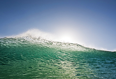 Sunlight reflecting on the water as it swells and splashes, Tarifa cadiz andalusia spain