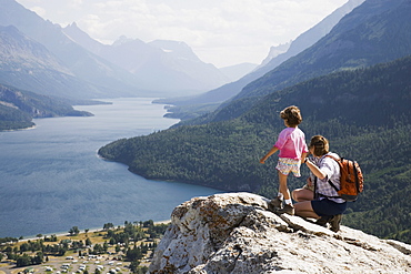 Mother And Daughter Enjoy View At Waterton Lakes National Park, Alberta Canada