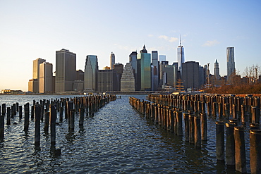 View Of Financial District Of Manhattan From Brooklyn Bridge Park At Sunset, New York City, New York, United States Of America