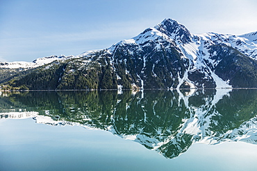 The Snow Covered Chugach Mountains Reflected In The Waters Of Barry Arm In Springtime, Chugach National Forest, Alaska, United States Of America