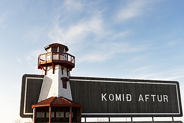 A Wooden Sign With Lighthouse Saying Komid Aftur In Hecla-Grindstone Provincial Park, Manitoba, Canada