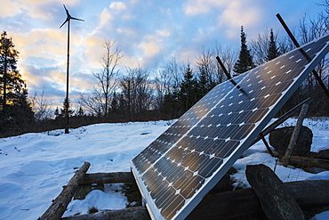 Solar Panel And Wind Turbine In Winter, Ontario, Canada