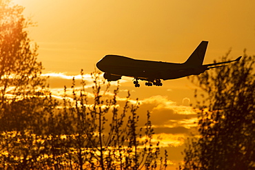 Silhouette Of A 747 Landing At Ted Stevens International Airport, Anchorage, Alaska, United States Of America