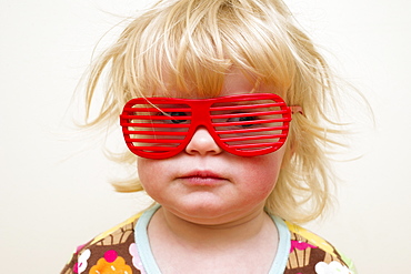 A Young Girl With Funny Red Eyeglasses, Alberta, Canada