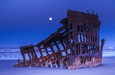 The Moon Sets Over The Wreck Of The Peter Iredale, Oregon, United States Of America