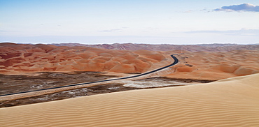 A Road Through The Desert Landscape, Liwa Oasis, Abu Dhabi, United Arab Emirates