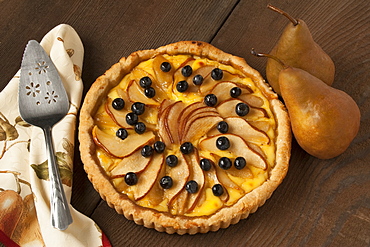 Food - Pear Custard Pie topped with Bosc pear slices and blueberries.