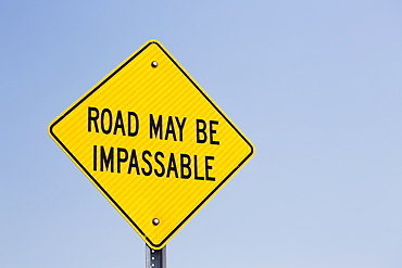 Close Up Of Impassable Road Sign With Blue Sky, Alberta, Canada