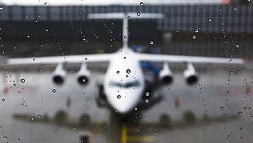 View Of The Front Of An Aircraft Through A Wet Window, Munich, Germany