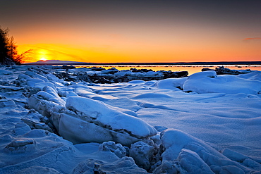 Sunset At Knik Arm In Winter, With Frozen Coast In The Foreground, Chugiak, Alaska, United States Of America