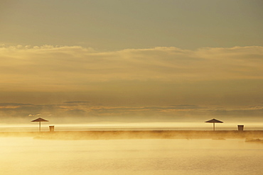 Northern Lake Baikal At Dawn On A Misty Summer Morning, Severobaikalsk, Buryatia, Siberia, Russia