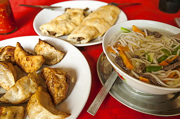 Special Tibetan Momos, Spring Rolls And Noodles In A Tibetan Restaurant, Pokhara, Nepal