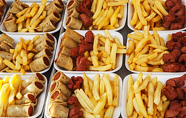 Fried Food Such As Wieners And Fries For Sale At A Stand, Puerto Vallarta, Jalisco, Mexico