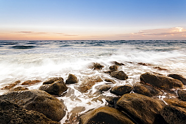 Sunset And Surf Along Rocks, Lydgate Beach, Wailua, Kauai, Hawaii, United States Of America