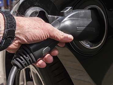 Black Electric Car Recharging, London, England