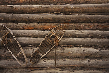 Snowshoes On Old Log House, Yellowknife, Northwest Territories, Canada