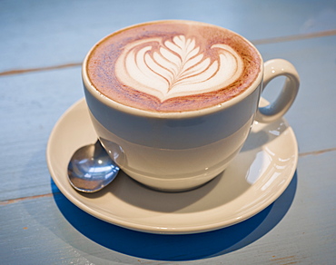 Hot Drink With Leaf Design In Milk On Surface, Vancouver, British Columbia, Canada