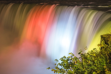 Rays Of Light And Magic Colours Of Illuminated Water Of Niagara Falls At Night, Niagara Falls, Ontario, Canada