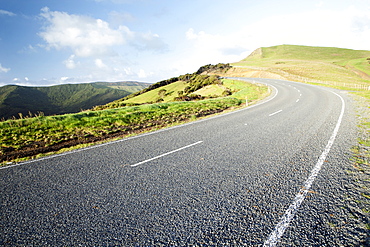 Perspective Of A Curving Road On The Top Of A Mountain, North Island, New Zealand