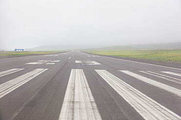 View Down The Runway Of The St. Paul Airport On A Misty Afternoon, St. Paul Island, Southwestern Alaska, USA, Summer