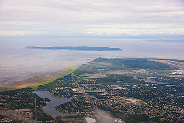 Aerial View Of The Sand Lake Neighborhood Of Anchorage, Fire Island, Kincaid Park, And The Anchorage International Airport Visible In The Background, Southcentral Alaska, USA, Summer