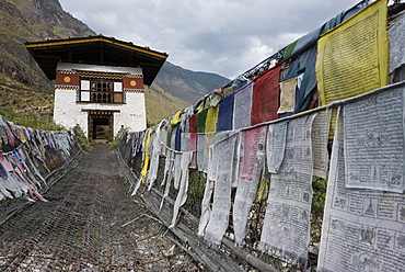 Suspension Bridge Made From Wood And Chain Across Paro River, Near Tachog Lhakhang Dzong, Paro, Bhutan