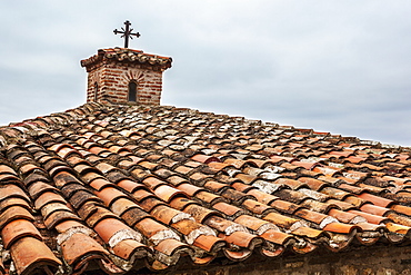 Tiles And Cross On Roof Of Monastery Varlaam, Meteora, Greece