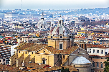 Dome Of Church Roof With Cross And Various Other Buildings, Rome, Italy