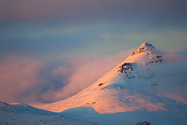 Light From The Sunset Illuminates The Mountains Along The Dempster Highway, Northern Yukon, Yukon, Canada