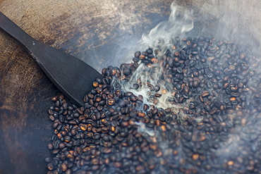 Coffee Beans Being Roasted By Hand In A Wok By The Coffee Pickers, Sumatra, Indonesia