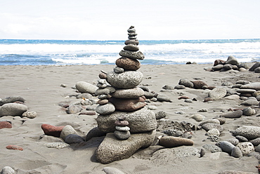 A Cairn Of Stones Is Beautifully Arranged On The Beach, Island Of Hawaii, Hawaii, United States Of America