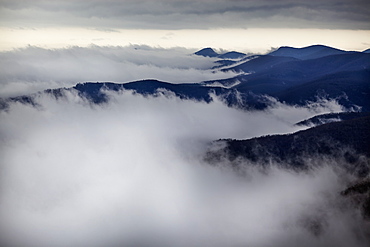 Looking Down On Storm Clouds Moving Up Western North Carolina Mountain Valleys With The Mountain Tops And High Ridges Visible, North Carolina, United States Of America