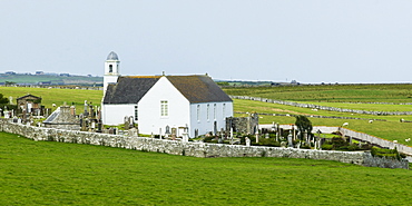 A White Church And Cemetery Surrounded By A Stone Fence, Latheron, Scotland