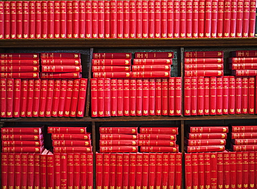 Abundance Of Red Books On A Shelving Unit, Yorkshire Dales, England