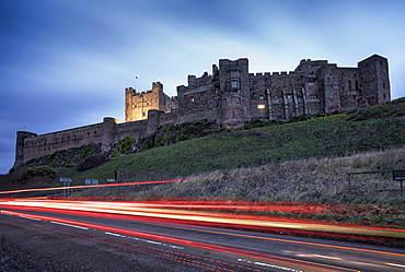 Light Trails On The Road And Bamburgh Castle, Bamburgh, Northumberland, England