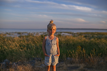 Portrait Of A Young Girl On A Beach At Sunset, Surrey, British Columbia, Canada