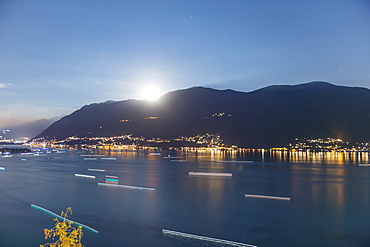 Moonlight Shining Over The Swiss Alps And Lake Maggiore, Ascona, Ticino, Switzerland