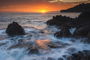 Sunrise And Surf Over Rocks, Hawaii, United States Of America