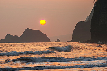 Morning Sun Burns Through A Thin Layer Of Clouds At Pololu Valley, Island Of Hawaii, Hawaii, United States Of America