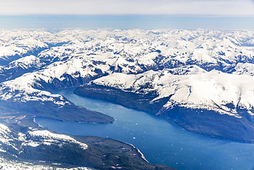 Aerial View Of A Glacier Fjord In The Inside Passage, And Snow Capped Peaks, Wrangell, Southeast Alaska, USA, Spring