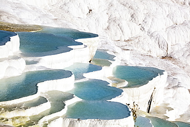 Hot Springs And Travertines, Terraces Of Carbonate Minerals Left By The Flowing Water, Pamukkale, Turkey