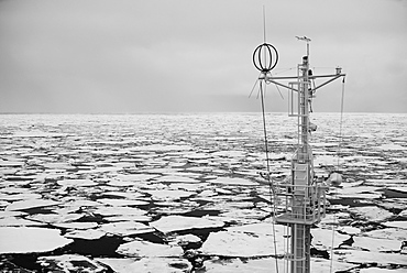 Mast Of A Ship In The Sea Filled With Floating Ice, Spitsbergen, Svalbard, Norway