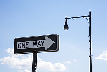 one Way' Traffic Sign And A Street Light, Connecticut, United States Of America