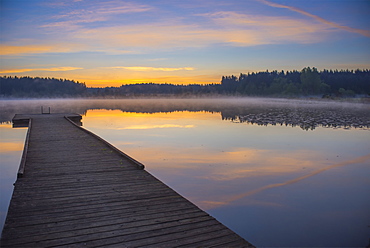 Reflection Of A Beautiful Serene Sunrise On Peaceful Scott Lake, Washington, United States Of America