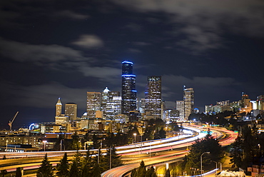 Night Image Of Seattle Cityscape And I-5 On A Cloudy Night, Seattle, Washington, United States Of America