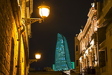 Mansions On Boyuk Qala Street With The Flame Towers In The Background At Night, Baku, Azerbaijan