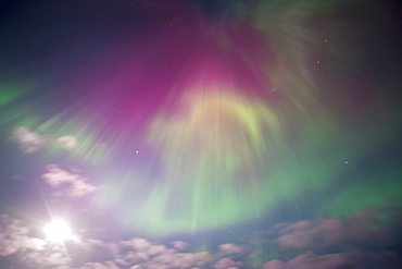 Aurora Borealis Display Over Turnagain Arm Near Girdwood, Alaska, With Full Moon, Alaska, United States Of America