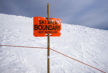 Orange Sign For Ski Area Boundary, Sunshine Ski Resort, Banff National Park, Banff, Alberta, Canada