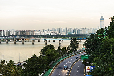 Bridges Crossing The Han River And A Road With Buildings In A Cityscape, Seoul, South Korea