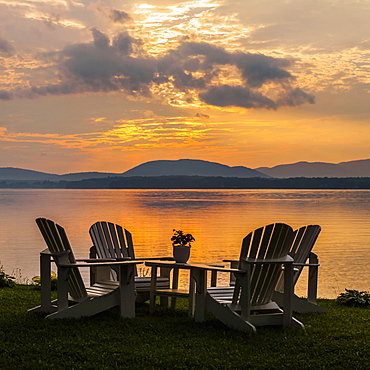 Sunset On Lake With Silhouetted Chairs On Wharf, Knowlton, Quebec, Canada